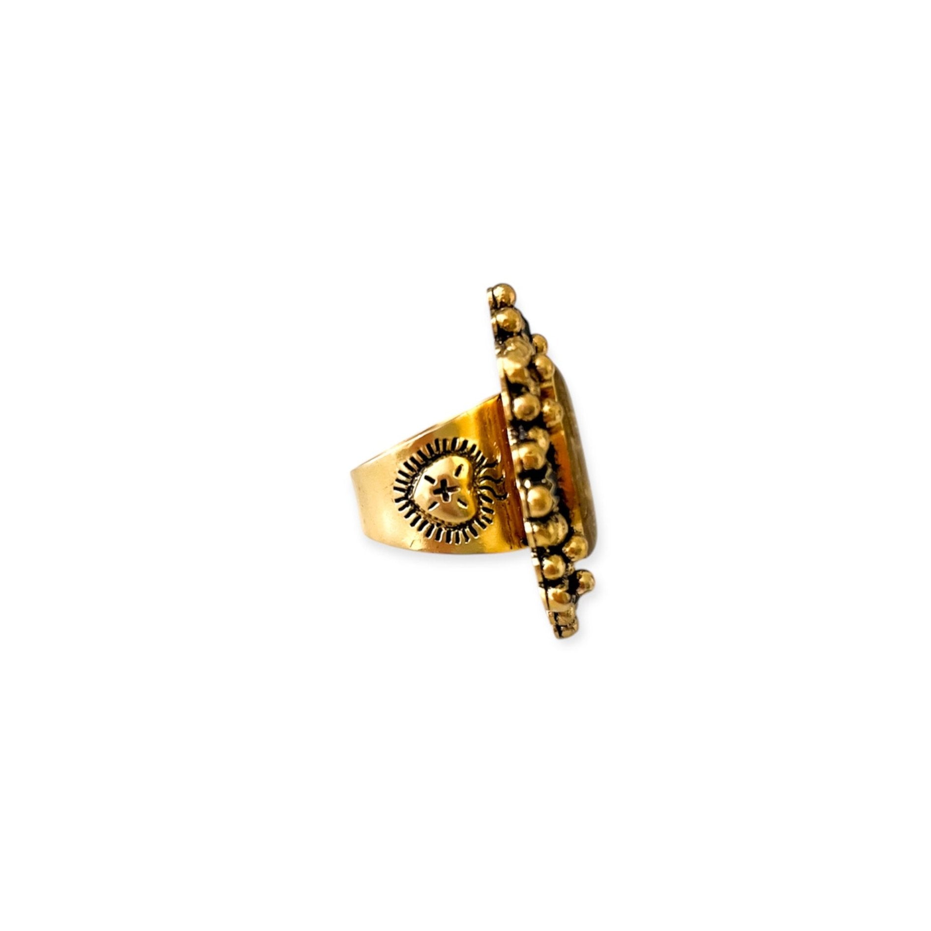 Oval Cloister Sacred Heart Ring in Bright Gold Montana